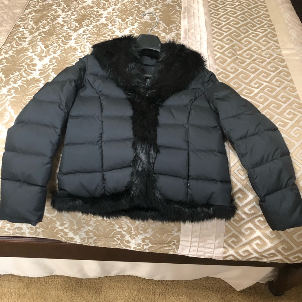 INC black puffer jacket with faux fur trim.two inside pockets for essentials.